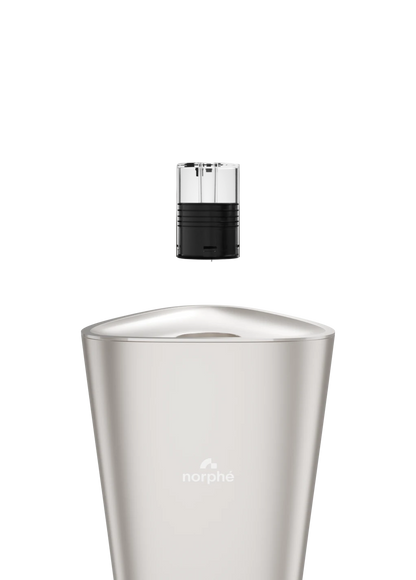 Norphé pod hovering above its slot on top of the Champagne M1 electronic hookah