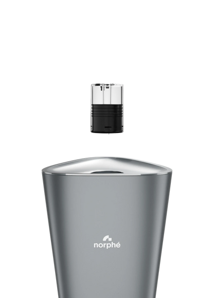 Norphé pod hovering above its slot on top of the Dark grey M1 electronic hookah
