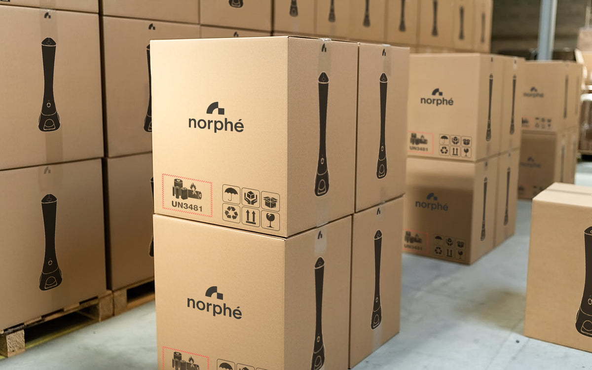 Norphé shipping boxes stacked in a warehouse