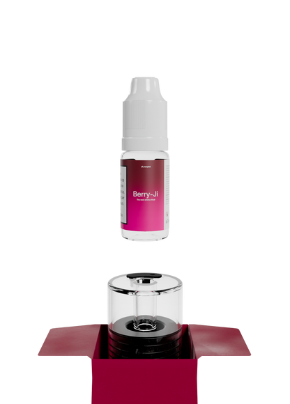 Flacon de recharge saveur Berry-Ji au-dessus d'une capsule Norphé vide dans sa boîte ouverte