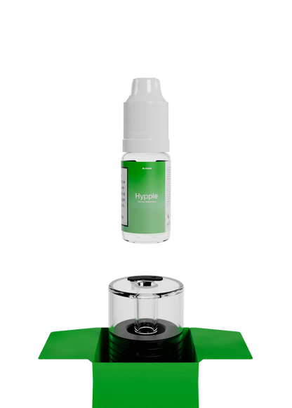Flacon de recharge saveur Hypple au-dessus d'une capsule Norphé vide dans sa boîte ouverte